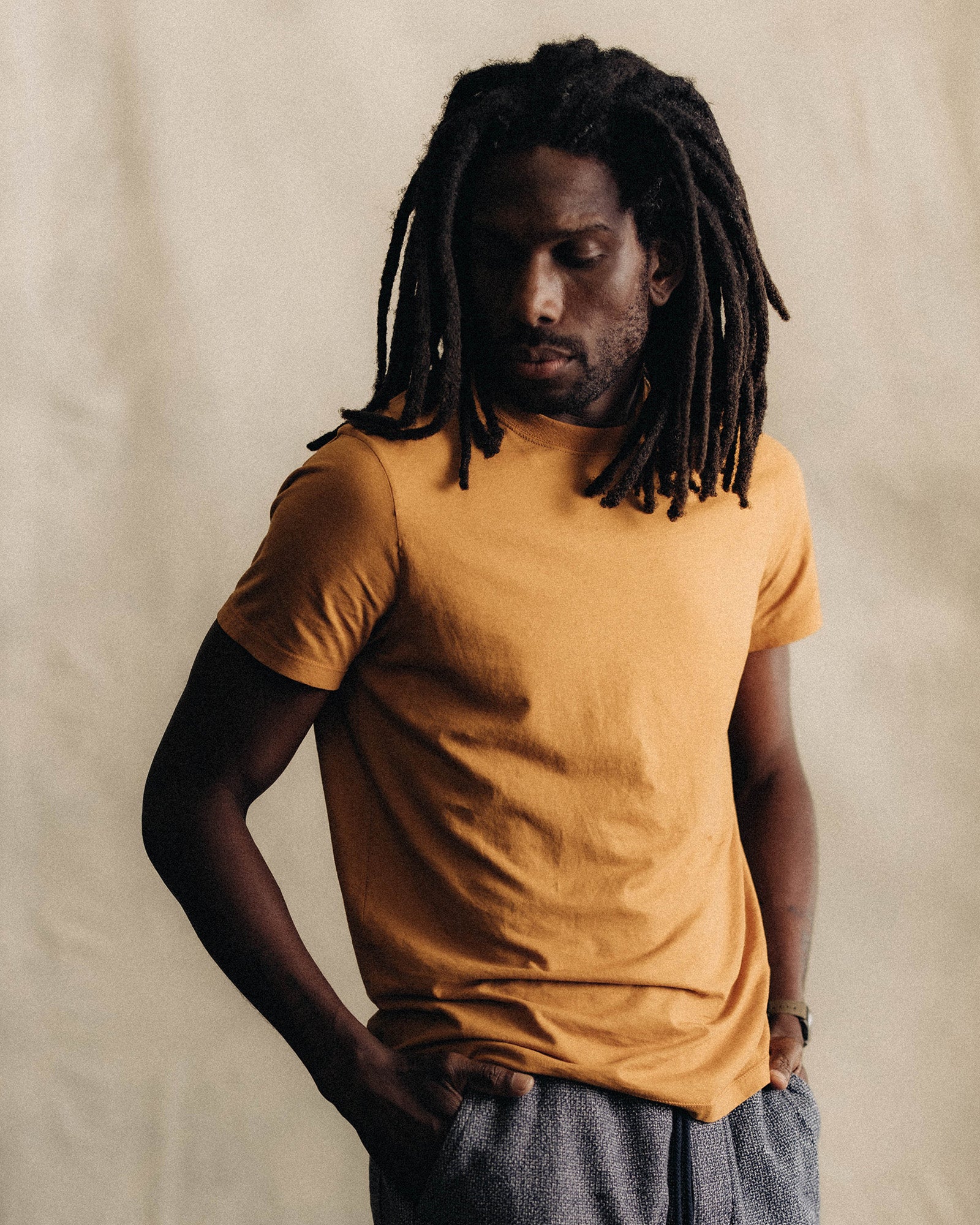 material shot of pickstitch hem with woven label, Knits by Taylor Stitch