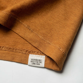 material shot of pickstitch hem with woven label