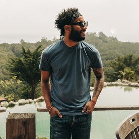 Fit Model standing in The Cotton Hemp Tee in Steel Blue