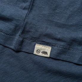 material shot of hem of The Cotton Hemp Tee in Steel Blue