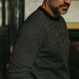fit model wearing The Everett Sweater in Black Birdseye, shoulder