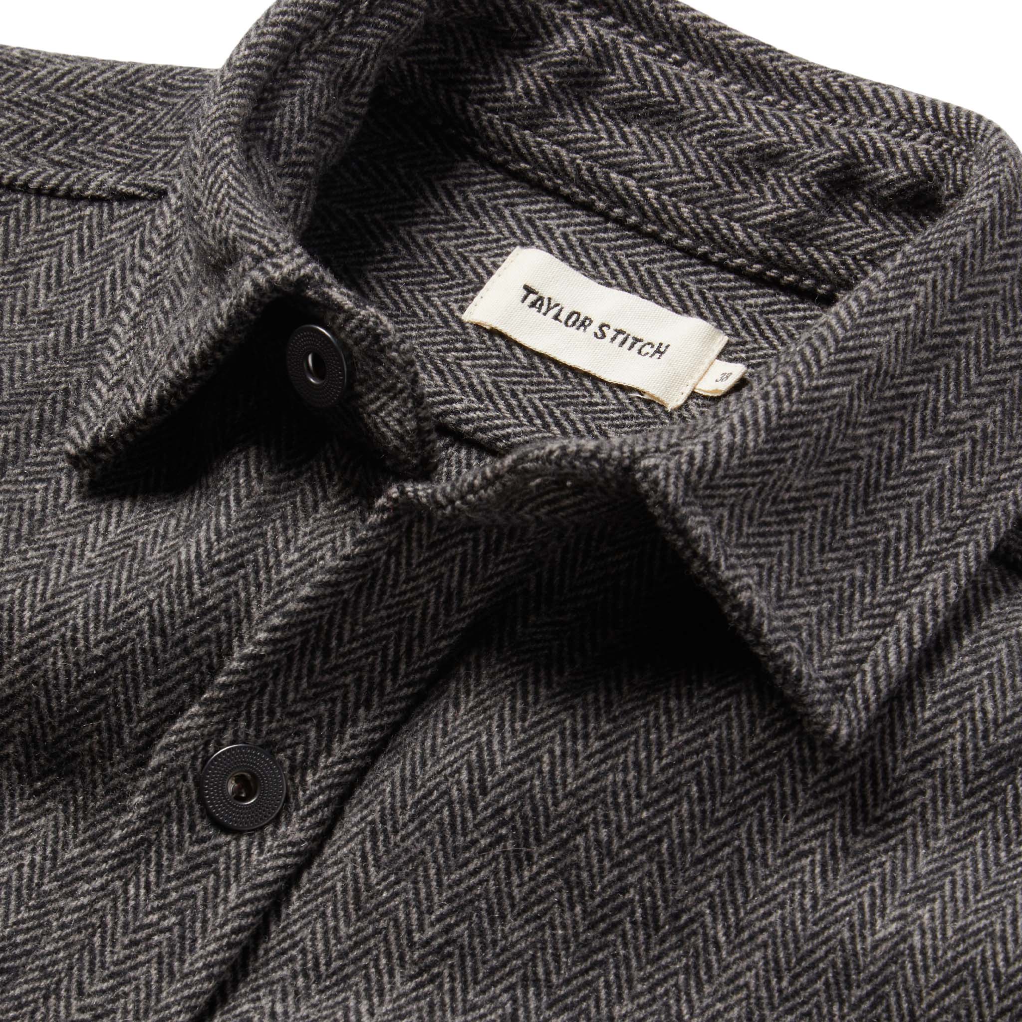 material shot of The Explorer Shirt in Coal Herringbone Wool showing interior label, Wovens by Taylor Stitch