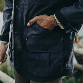 fit model with hand in pocket of The Field Jacket in Midnight