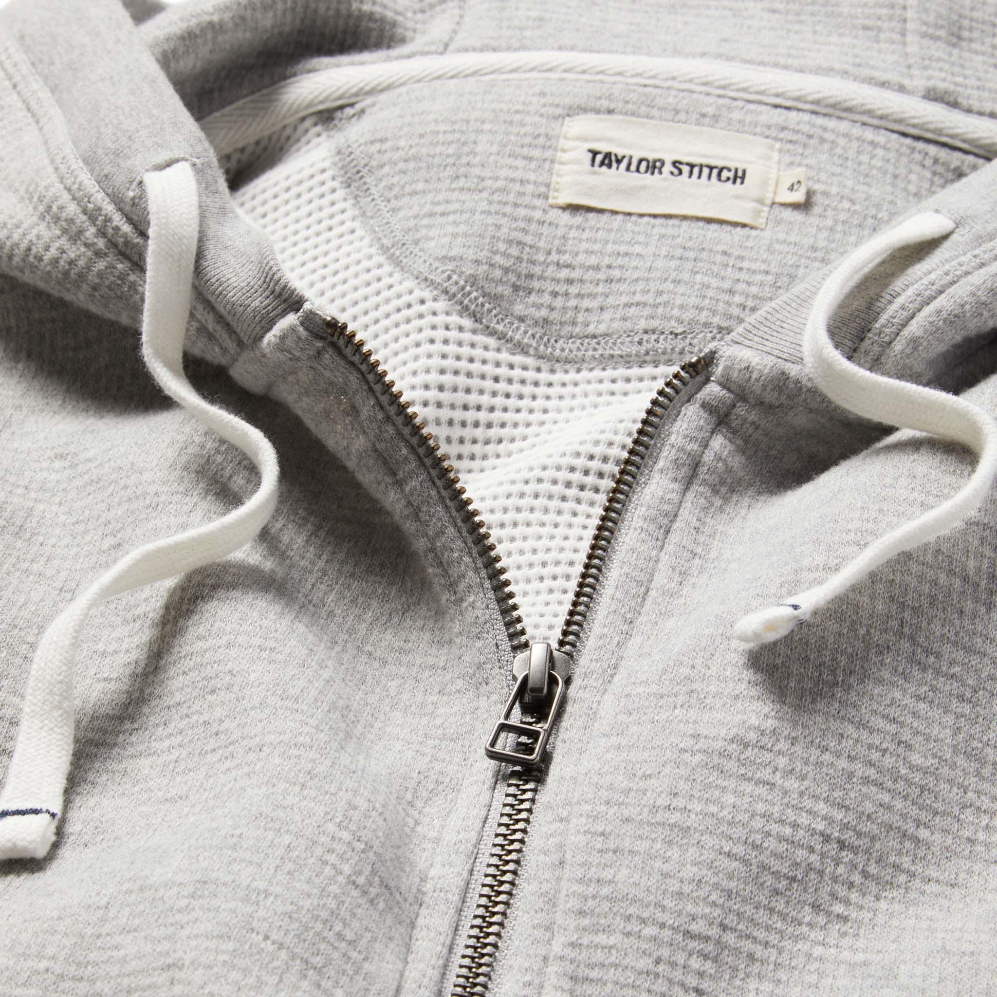 material shot of The Fillmore Hoodie in Ash Double Knit showing interior label, Knits by Taylor Stitch