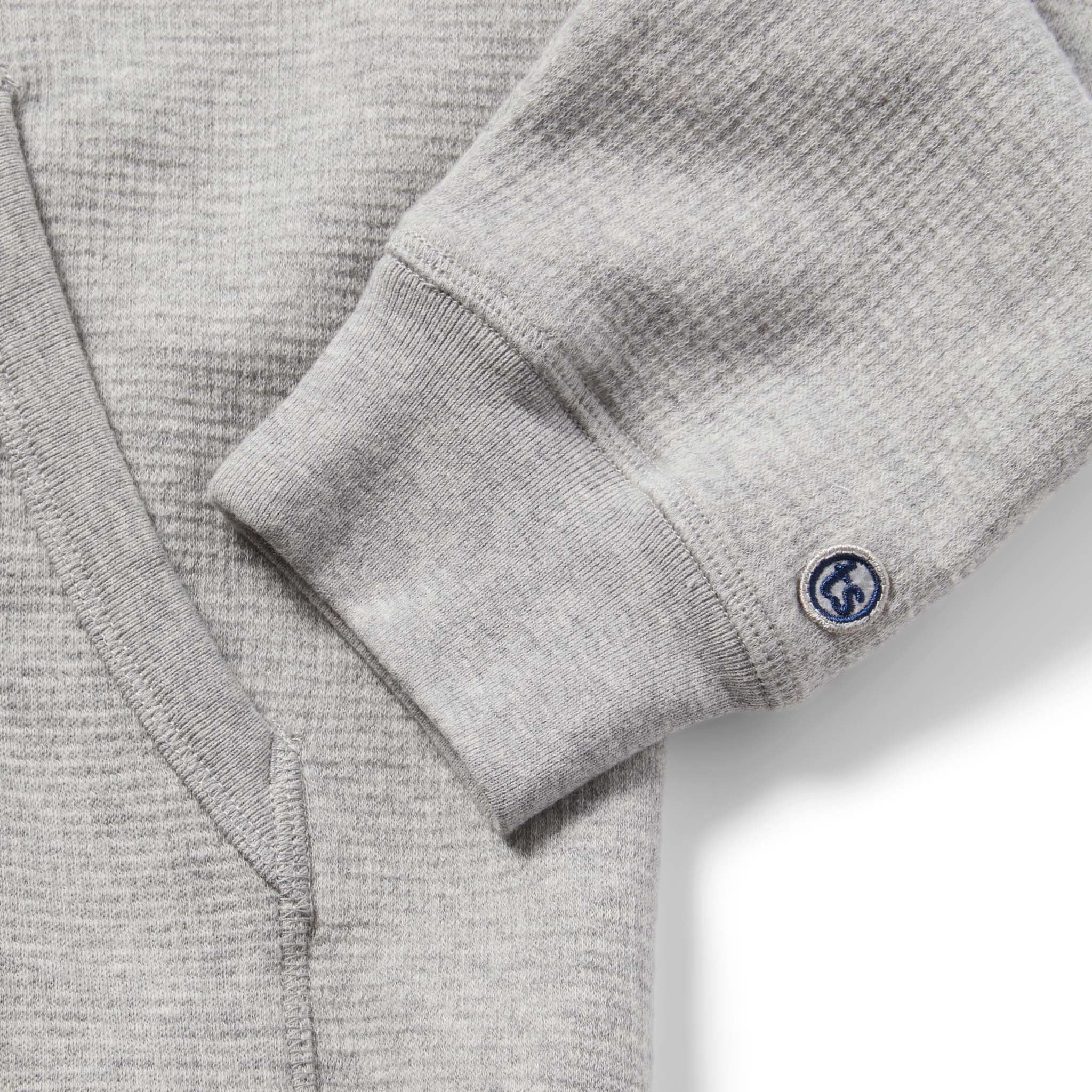 material shot of The Fillmore Hoodie in Ash Double Knit showing cuff embroidery, Knits by Taylor Stitch