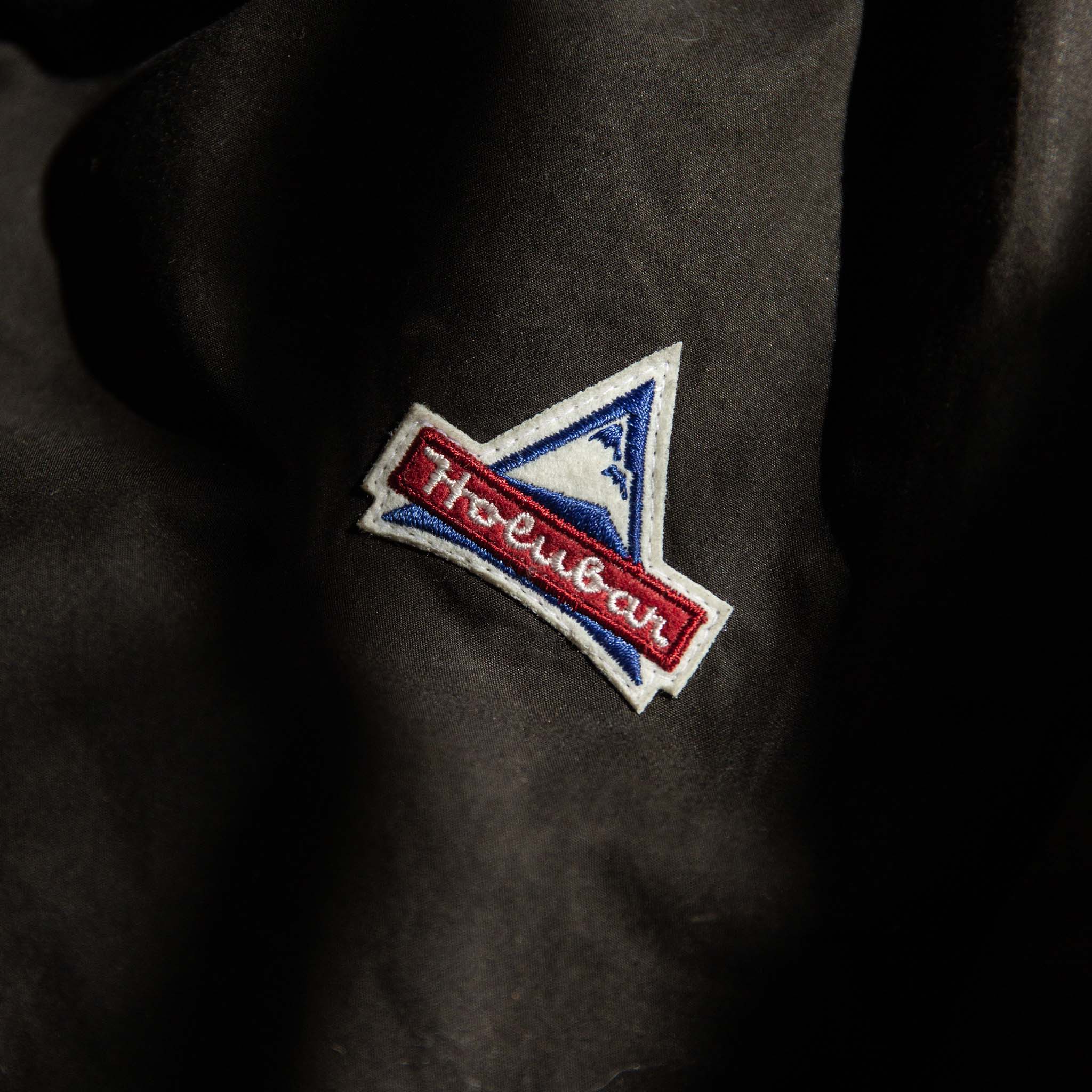 material shot of The Flatiron Jacket showing Holubar patch, Outerwear by Taylor Stitch