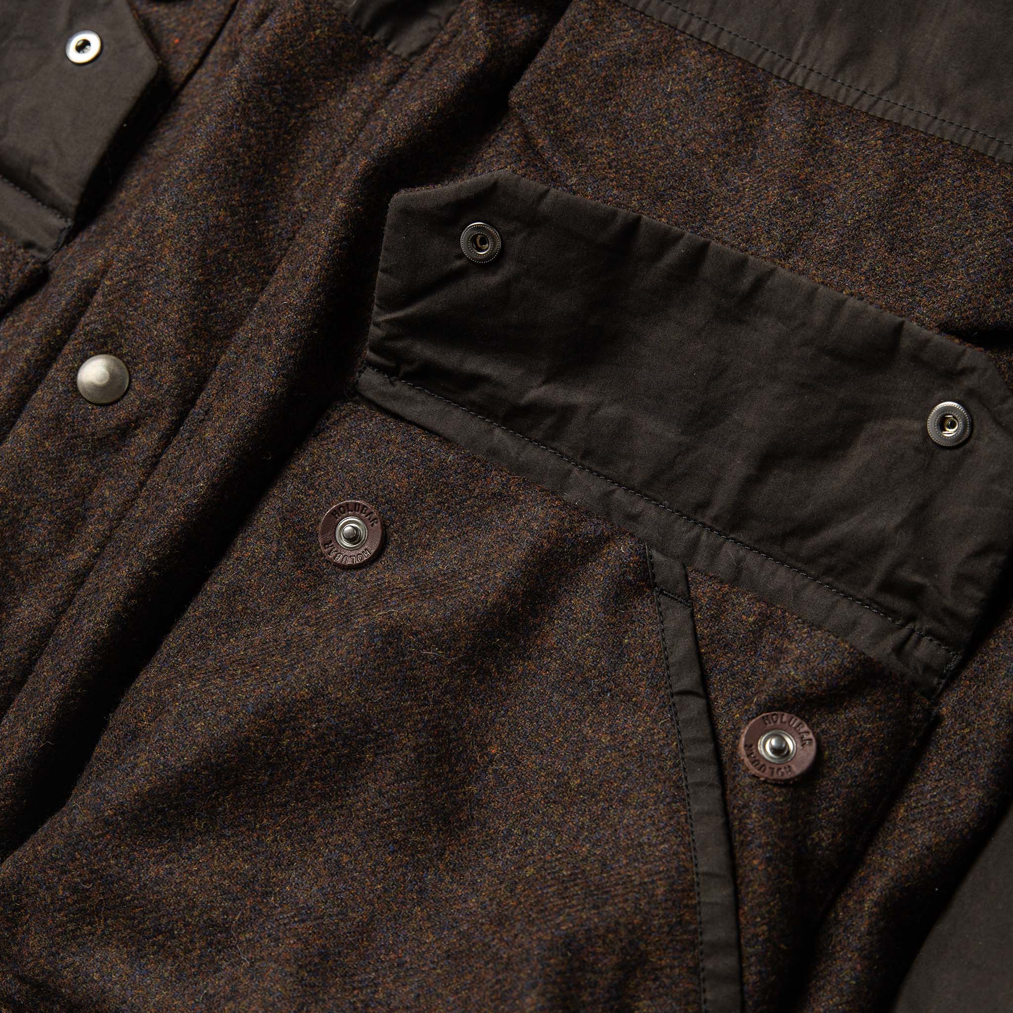 material shot of The Flatiron Jacket with front pockets open, Outerwear by Taylor Stitch