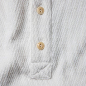 material shot of the placket of The Heavy Bag Waffle Henley in Natural