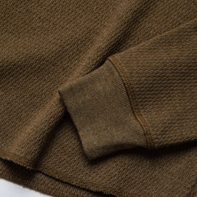material shot of the sleeve cuff of The Heavy Bag Waffle Crewneck in Olive