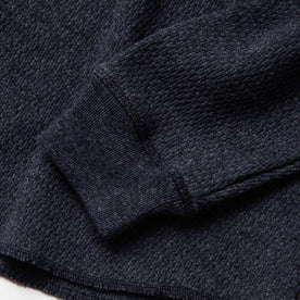 material shot of sleeve cuff of The Heavy Bag Waffle Henley in Navy