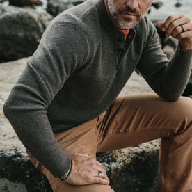 fit model wearing The Hudson Sweater in Walnut, sitting