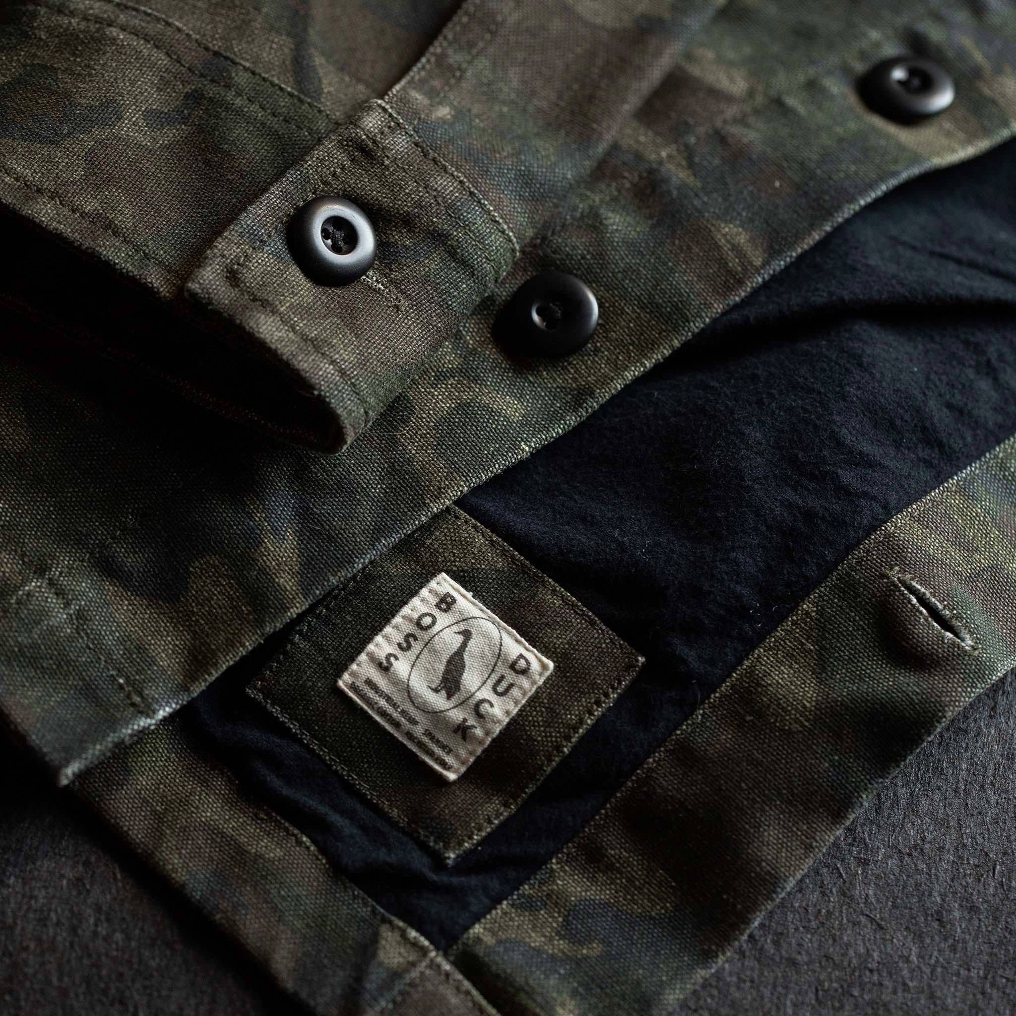material shot of boss duck logo, Outerwear by Taylor Stitch