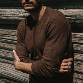 fit model wearing the lodge sweater, arms crossed