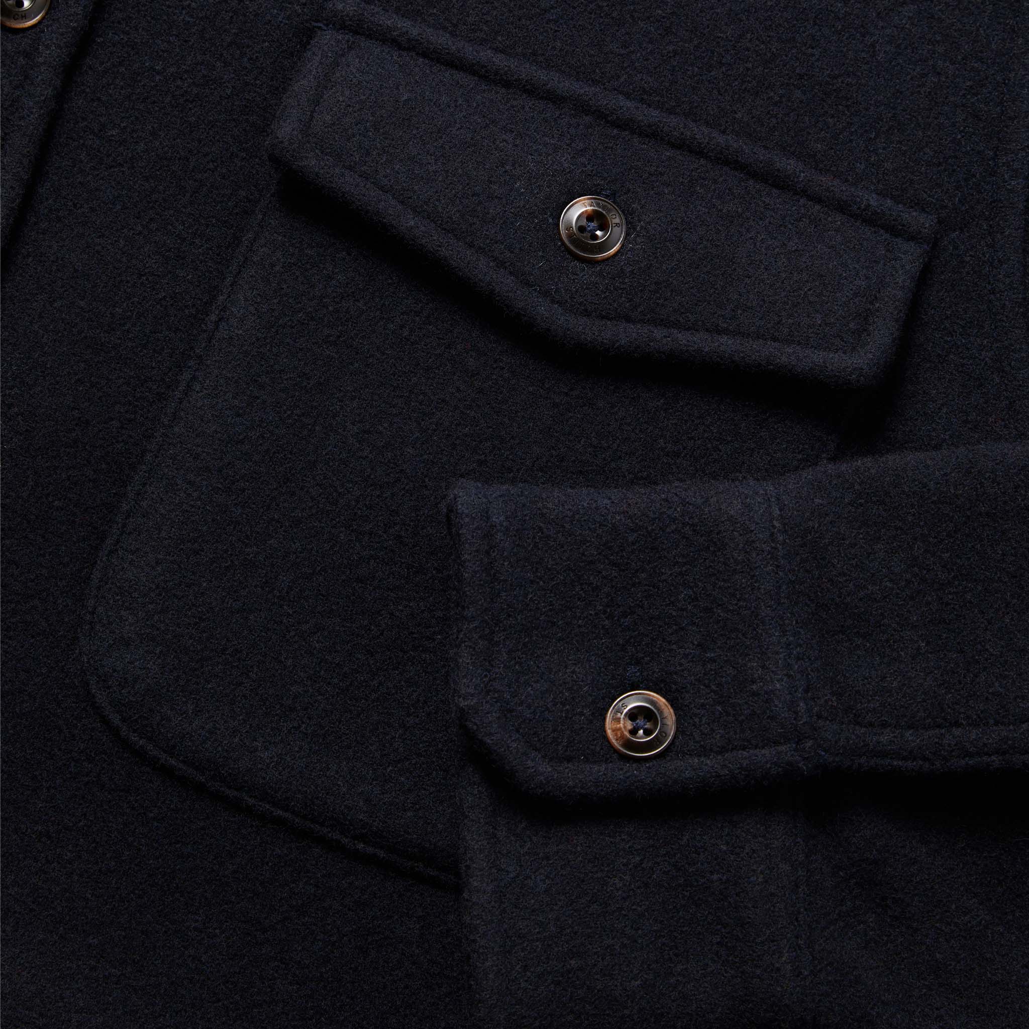 material shot of The Maritime Shirt in Navy Wool showing chest pocket and sleeve cuff, Wovens by Taylor Stitch