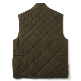 flatlay of The Quilted Bomber Vest in Olive Dry Wax from the back