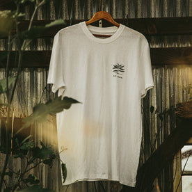 material shot of The Cotton Hemp Tee in Natural Give to Get, hanging