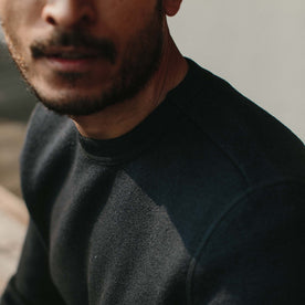 Fit model wearing The Weekend Crewneck in Navy Boiled Wool with shoulder seam in front