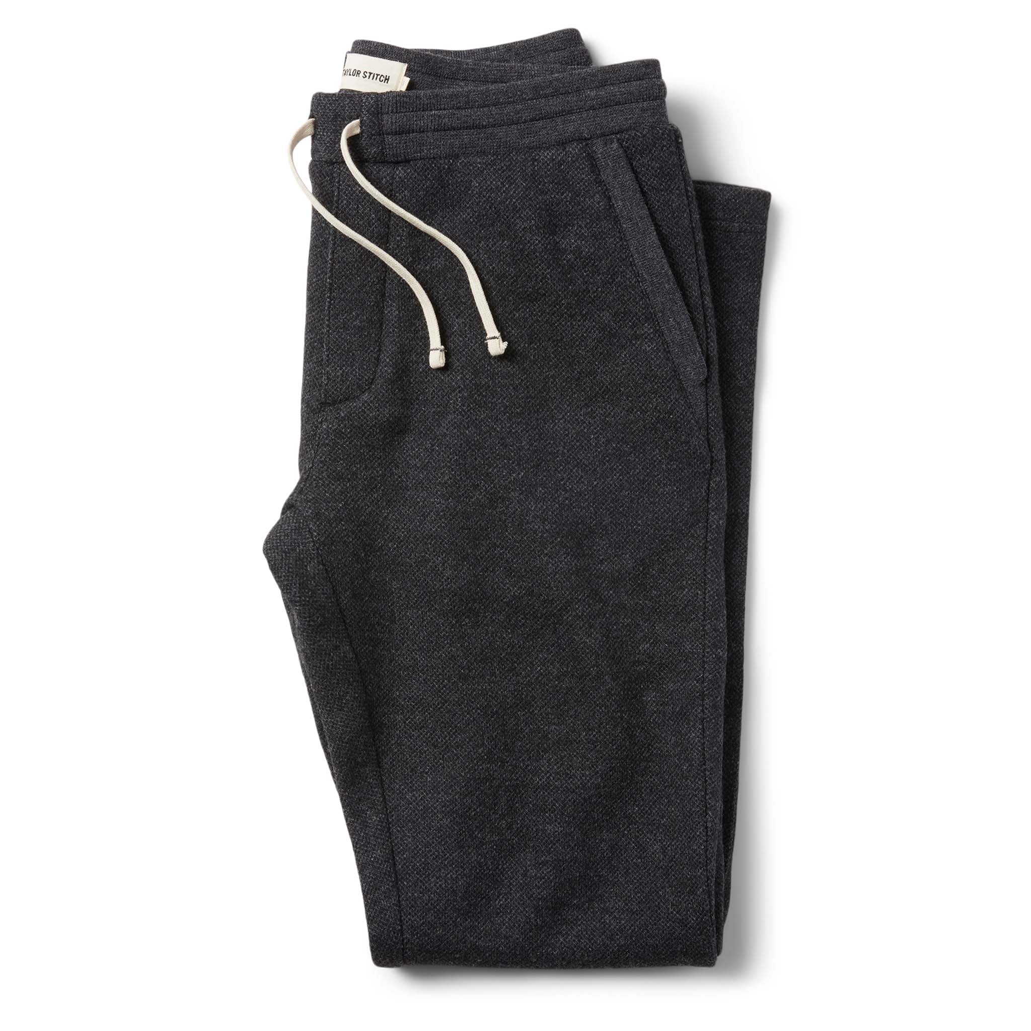flatlay of The Weekend Pant in Charcoal Herringbone Wool, Bottoms by Taylor Stitch