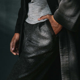fit model wearing The Weekend Pant in Charcoal Herringbone Wool with hand in pocket