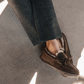 fit model wearing The Weekend Pant in Charcoal Herringbone Wool with slippers