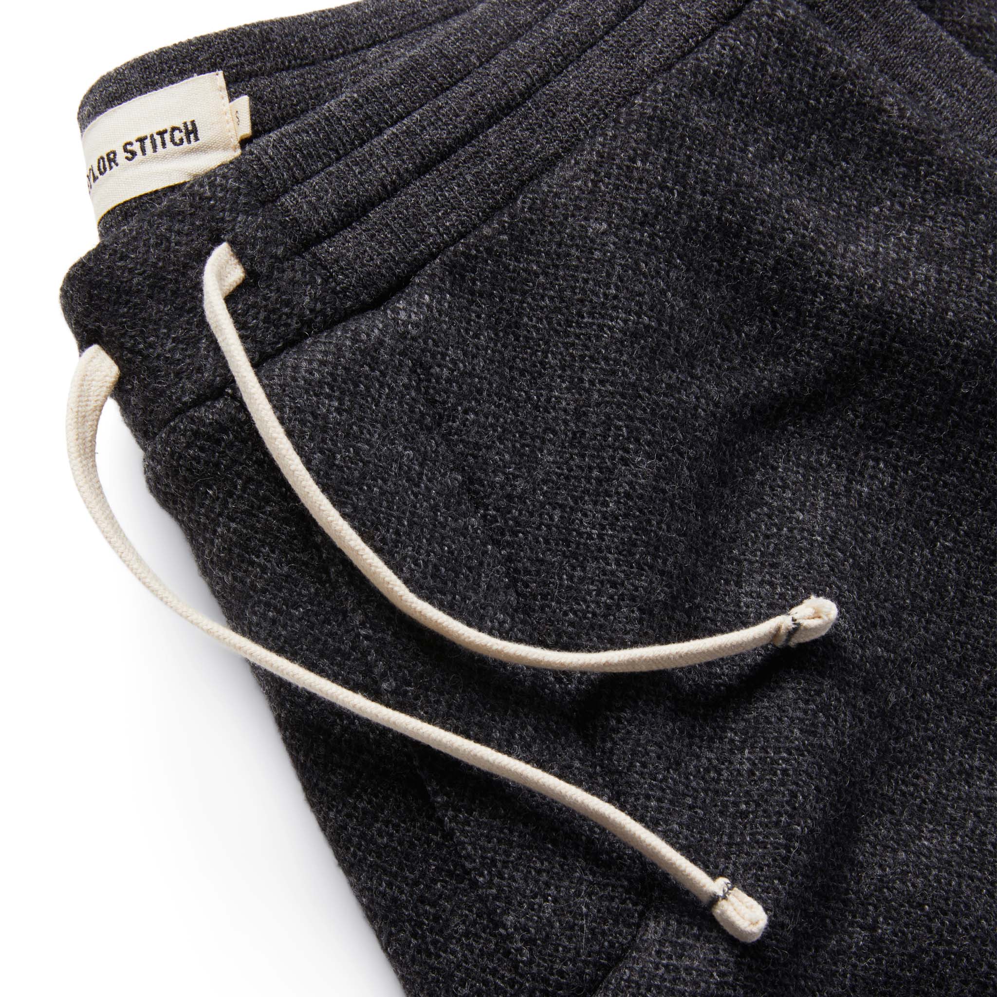 material shot of The Weekend Pant in Charcoal Herringbone Wool close up on the fly, Bottoms by Taylor Stitch