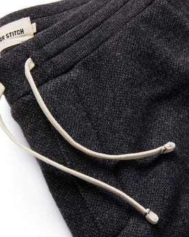 material shot of The Weekend Pant in Charcoal Herringbone Wool close up on the fly, Bottoms by Taylor Stitch