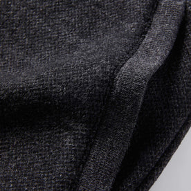 material shot of The Weekend Pant in Charcoal Herringbone Wool showing ribbing at pocket