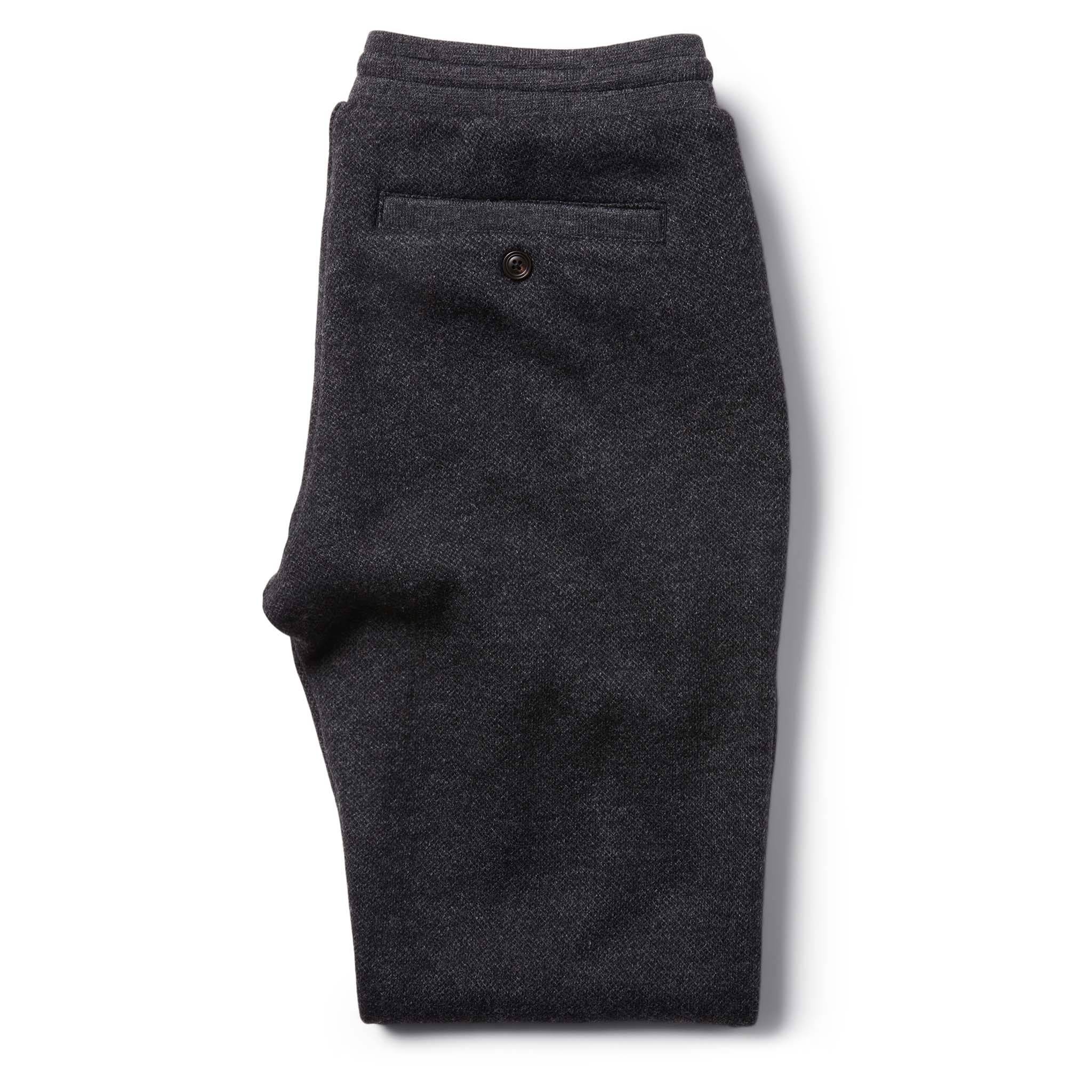 flatlay of The Weekend Pant in Charcoal Herringbone Wool from the back folded, Bottoms by Taylor Stitch