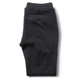 flatlay of The Weekend Pant in Charcoal Herringbone Wool from the back folded