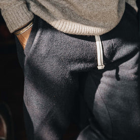 Fit model wearing The Weekend Pant in Navy Boiled Wool with hands in pocket