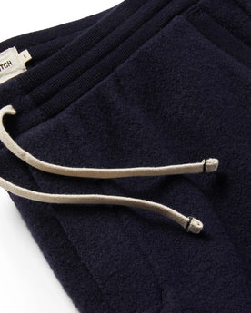 Material shot of The Weekend Pant in Navy Boiled Wool showing drawstrings, Bottoms by Taylor Stitch