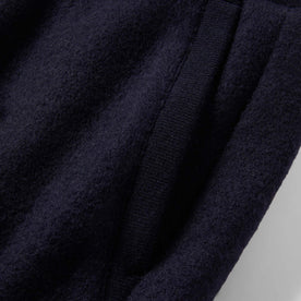 material shot of The Weekend Pant in Navy Boiled Wool showing quarter top pocket