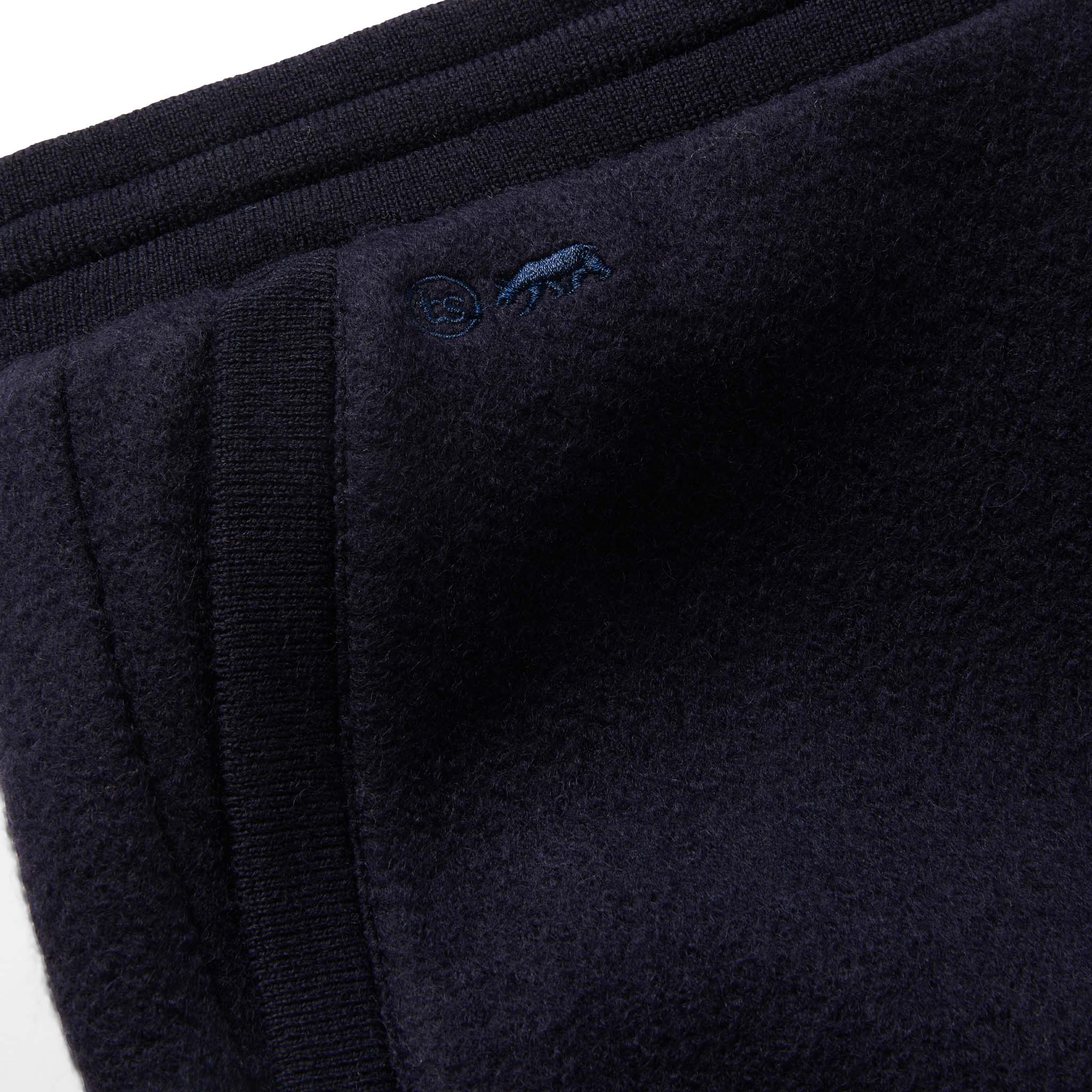Material shot of The Weekend Pant in Navy Boiled Wool showing the embroidery , Bottoms by Taylor Stitch