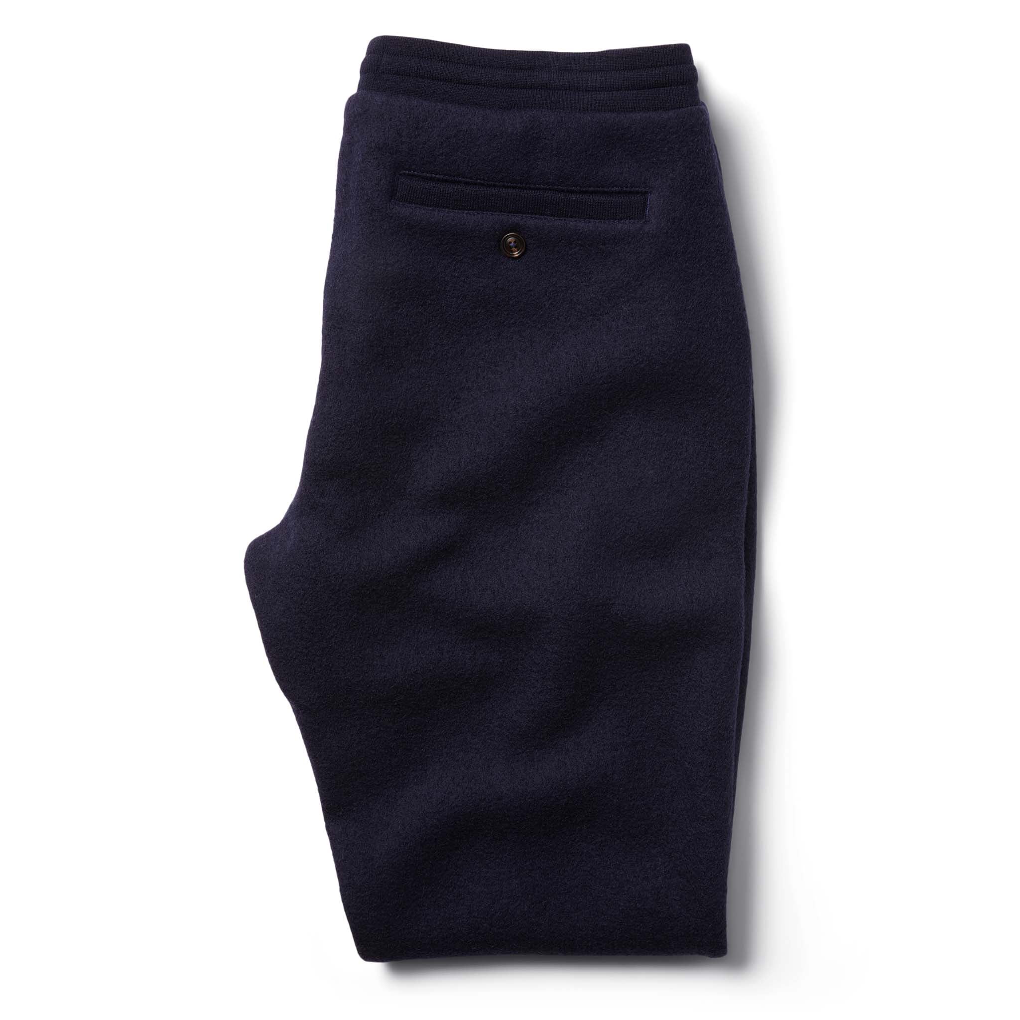 Flatlay of The Weekend Pant in Navy Boiled Wool folded from the back, Bottoms by Taylor Stitch