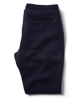 Flatlay of The Weekend Pant in Navy Boiled Wool folded from the back, Bottoms by Taylor Stitch