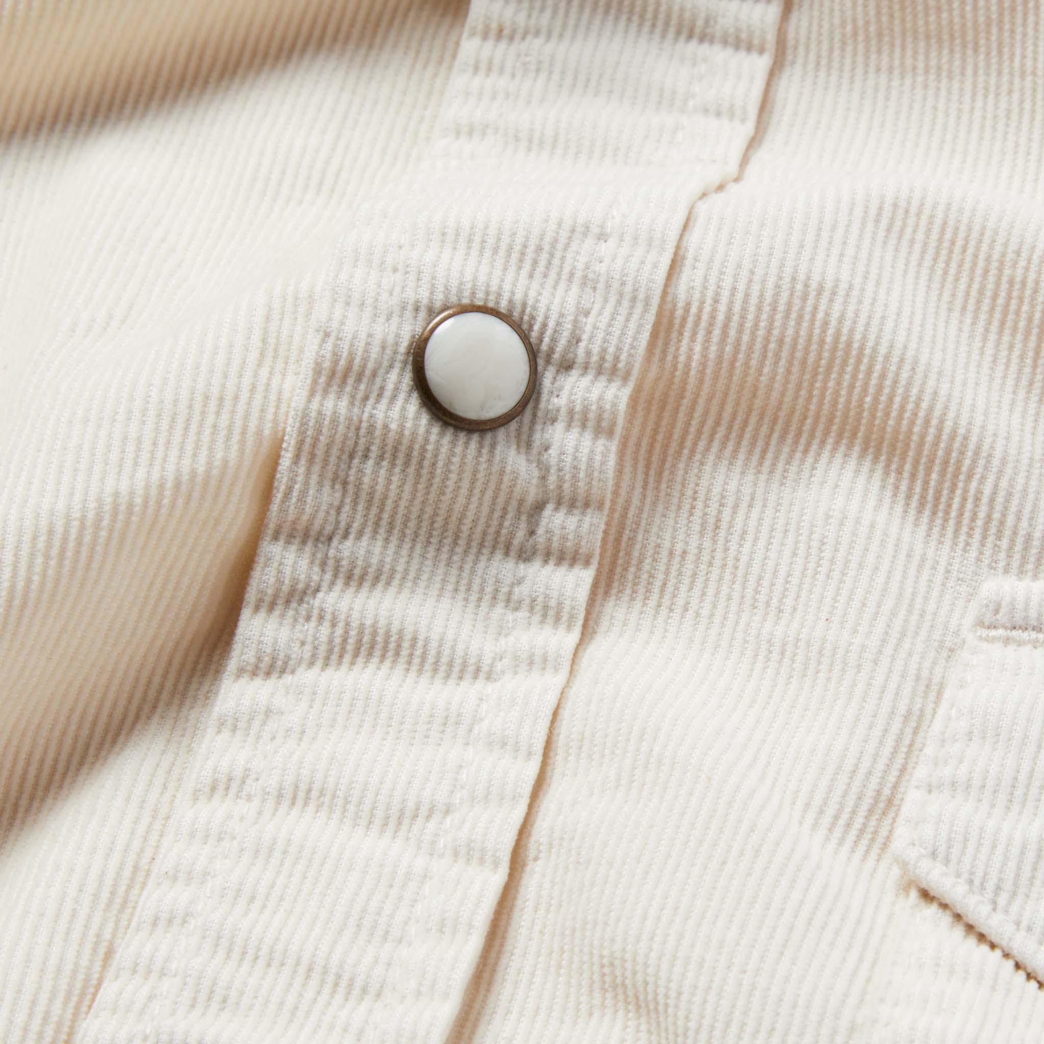 material shot of the shirt with the placket close up and focusing on the button, Wovens by Taylor Stitch