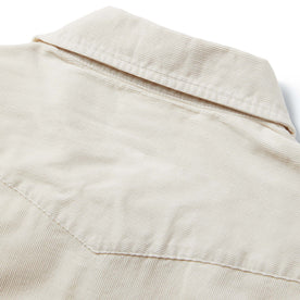 material shot of the shirt from the back with the yoke visible