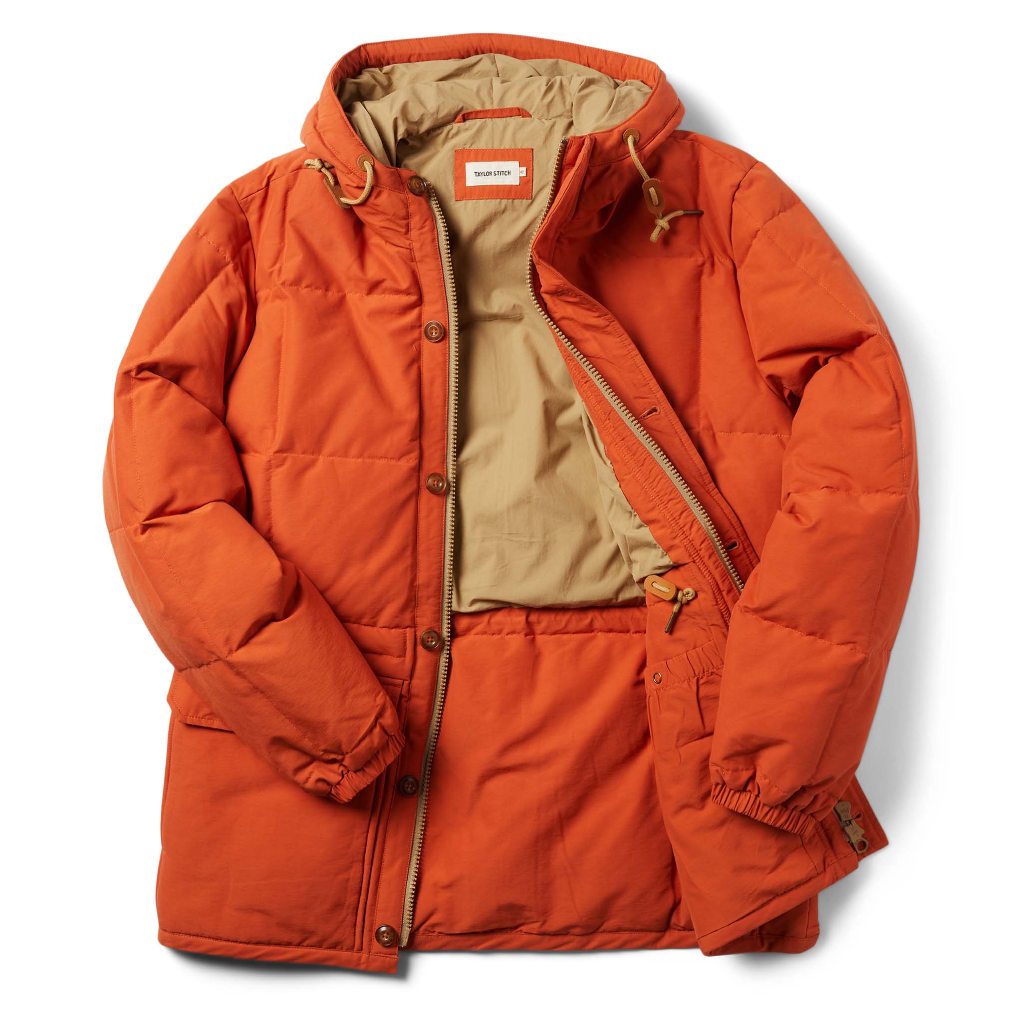 flatlay of the open front of The Whitney Parka in Dusty Orange, Outerwear by Taylor Stitch