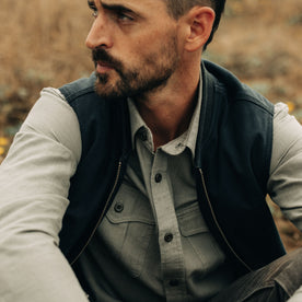 fit model wearing The Workhorse Vest in Coal Boss Duck, chest detail