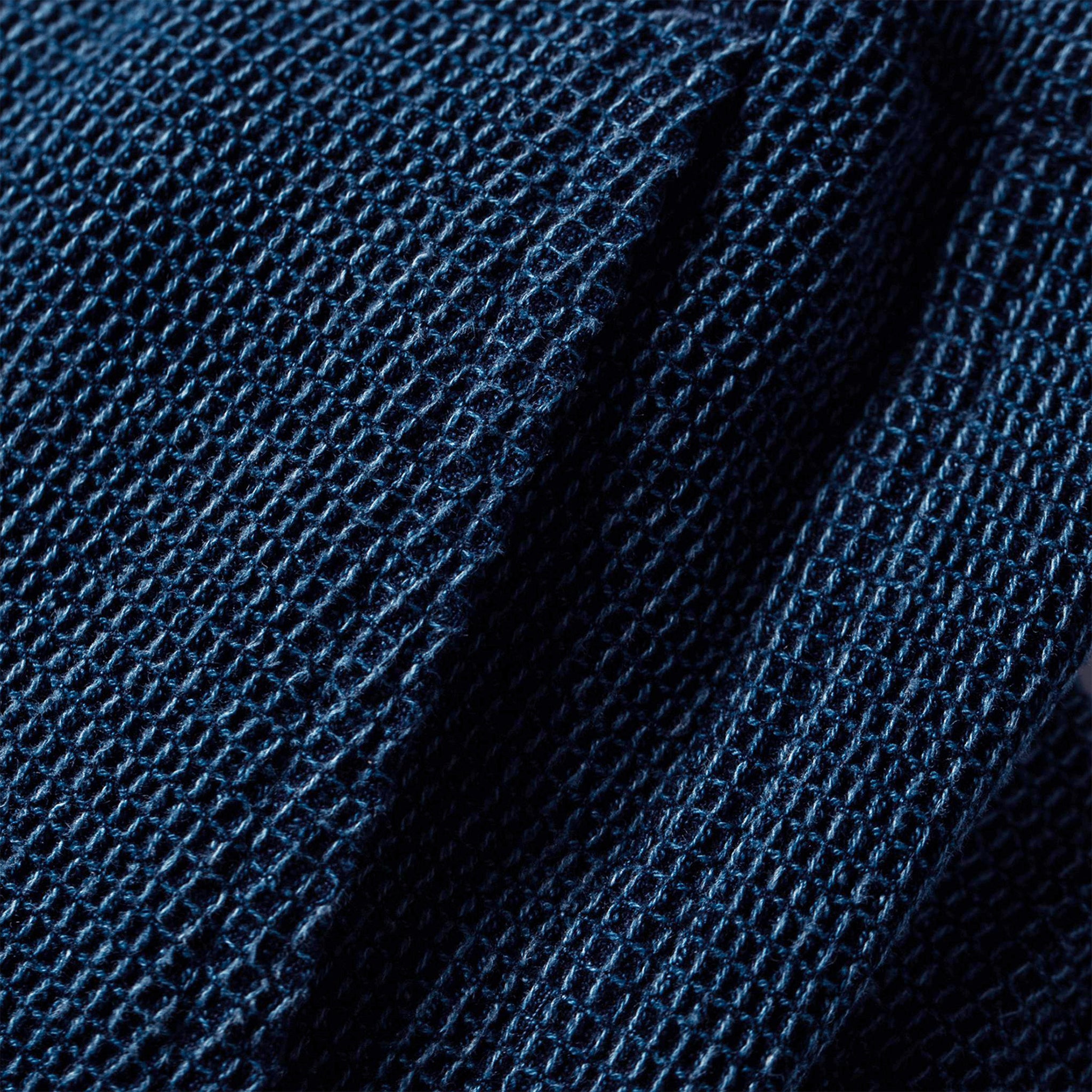 material shot of the pocket on The Apres Pant in Indigo Waffle, Bottoms by Taylor Stitch