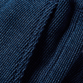 material shot of the pocket on The Apres Pant in Indigo Waffle