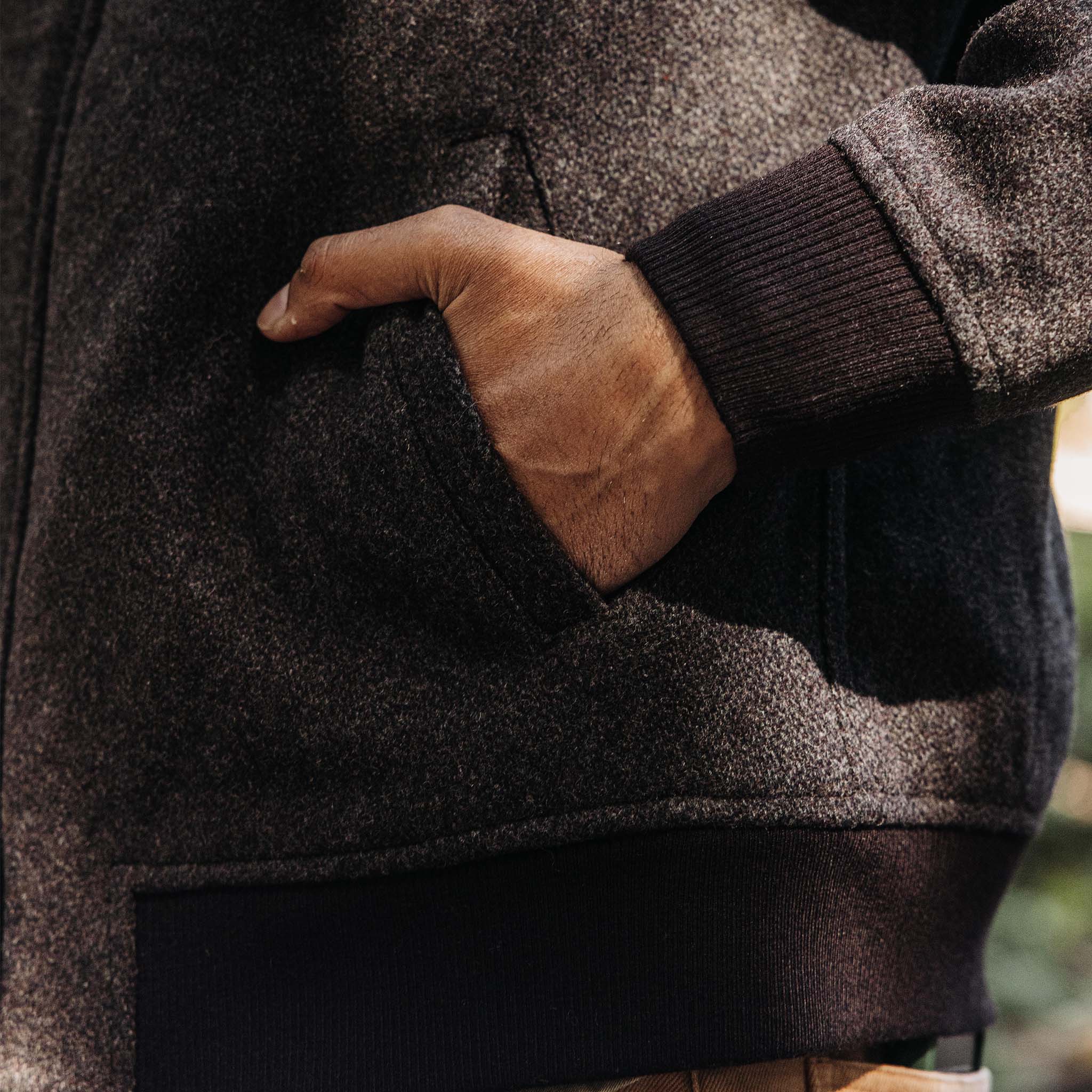 fit modle with his hand in his pocket of The Bomber Jacket in Espresso Marl Wool, Outerwear by Taylor Stitch