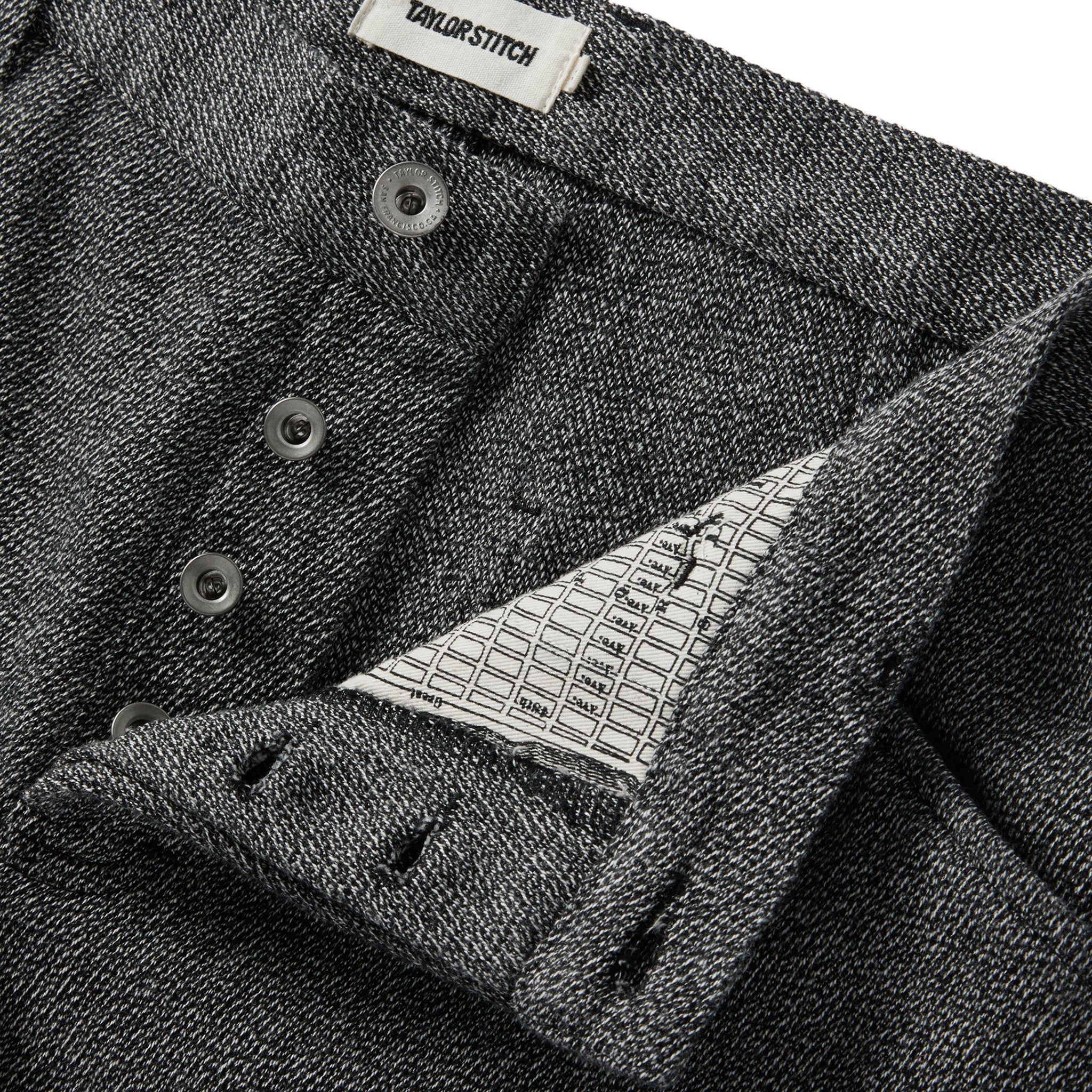 material shot of the button fly on The Camp Pant in Indigo Salt and Pepper , Bottoms by Taylor Stitch