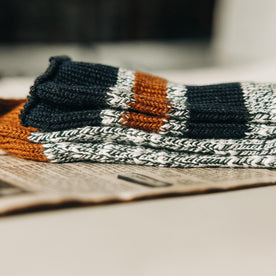 material shot of The Camp Sock in Heather Olive folded