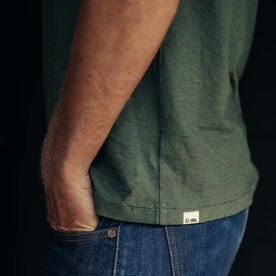 fit model showing logo and hem on The Cotton Hemp Tee in Pine