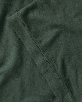 material shot of the cuff on The Cotton Hemp Tee in Pine, Knits by Taylor Stitch