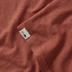 material shot of the logo patch  on The Cotton Hemp Long Sleeve in Engine
