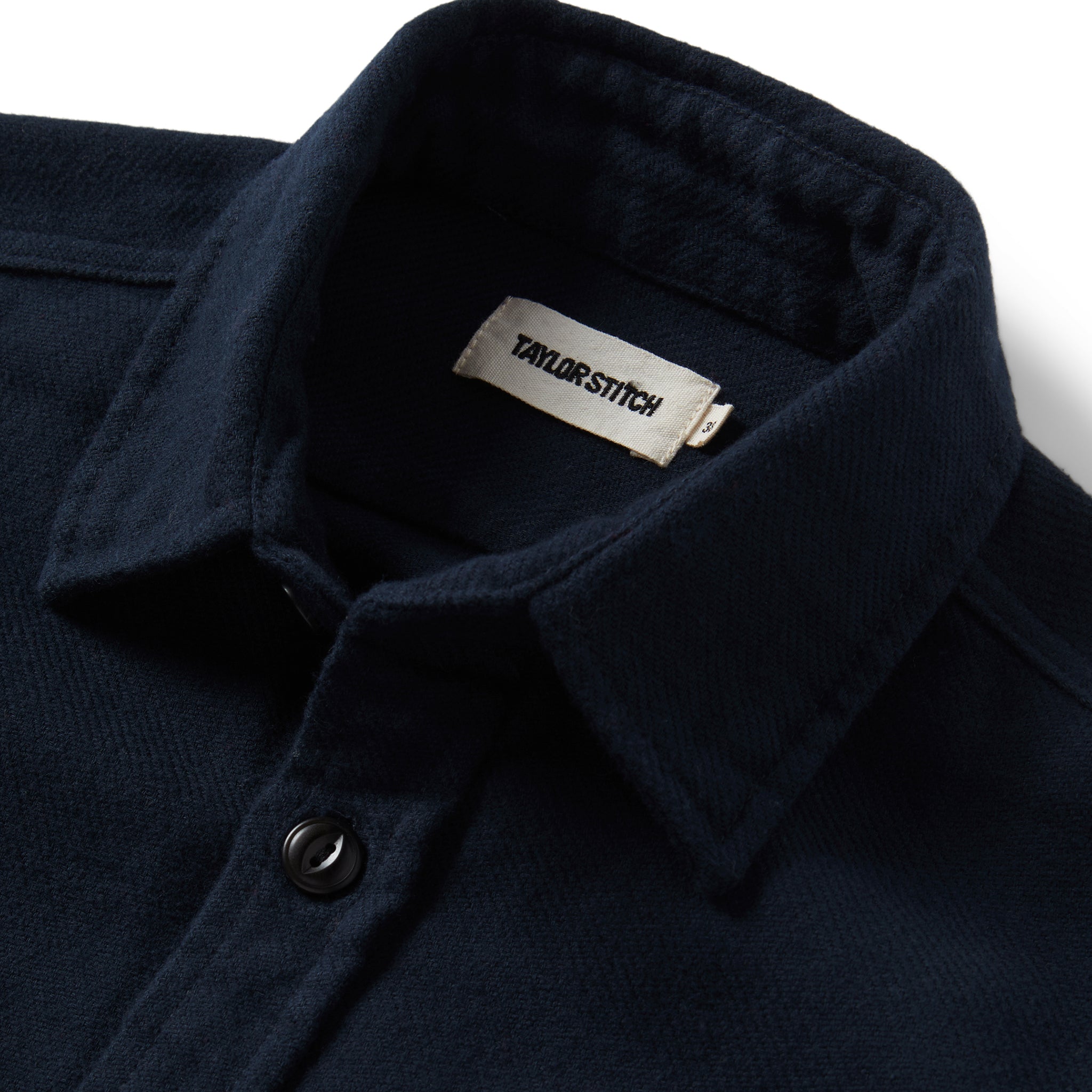 material shot of the collar on The Crater Shirt in Navy Twill, Wovens by Taylor Stitch