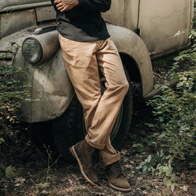 fit model wearing The Democratic All Day Pant in Washed Tobacco Selvage