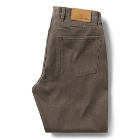 flatlay of The Democratic All Day Pant in Washed Walnut Selvage, shown folded from the back